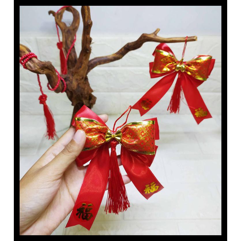 

Pita Hampers Imlek Pita Kado Hiasan Pacel - Pita Cantik Dekorasi Imlek - Golden Plum