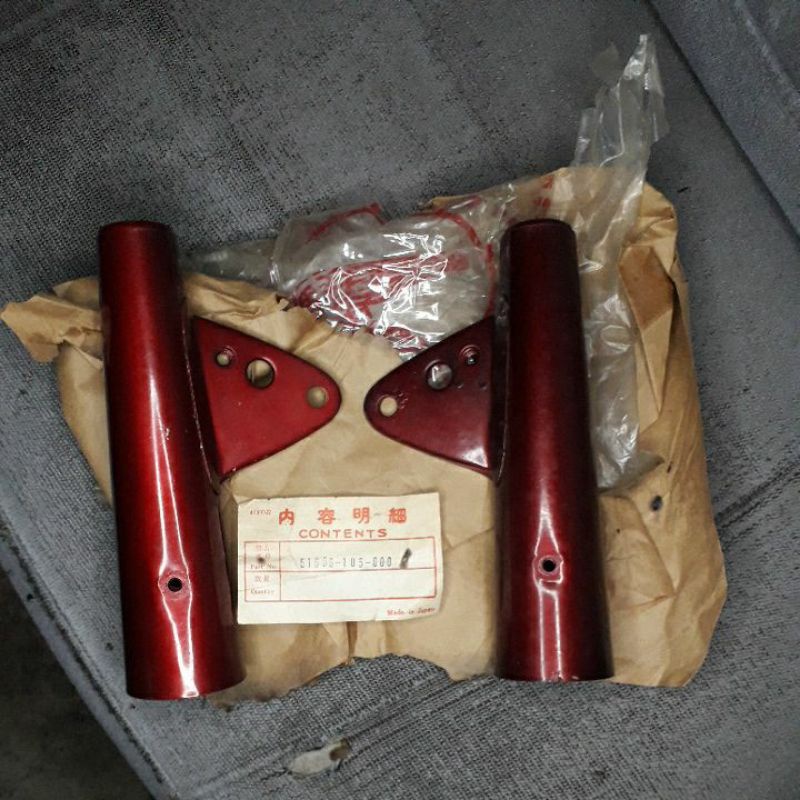 kupingan lampu depan honda cb100 original baru