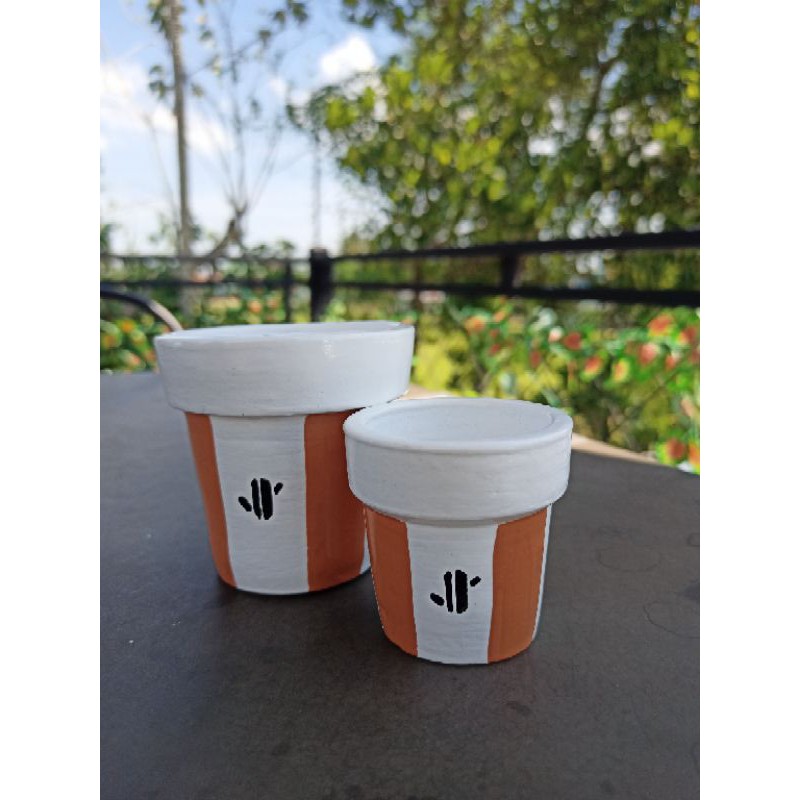 

Pot Gerabah Lukis Alur Coklat Lucu