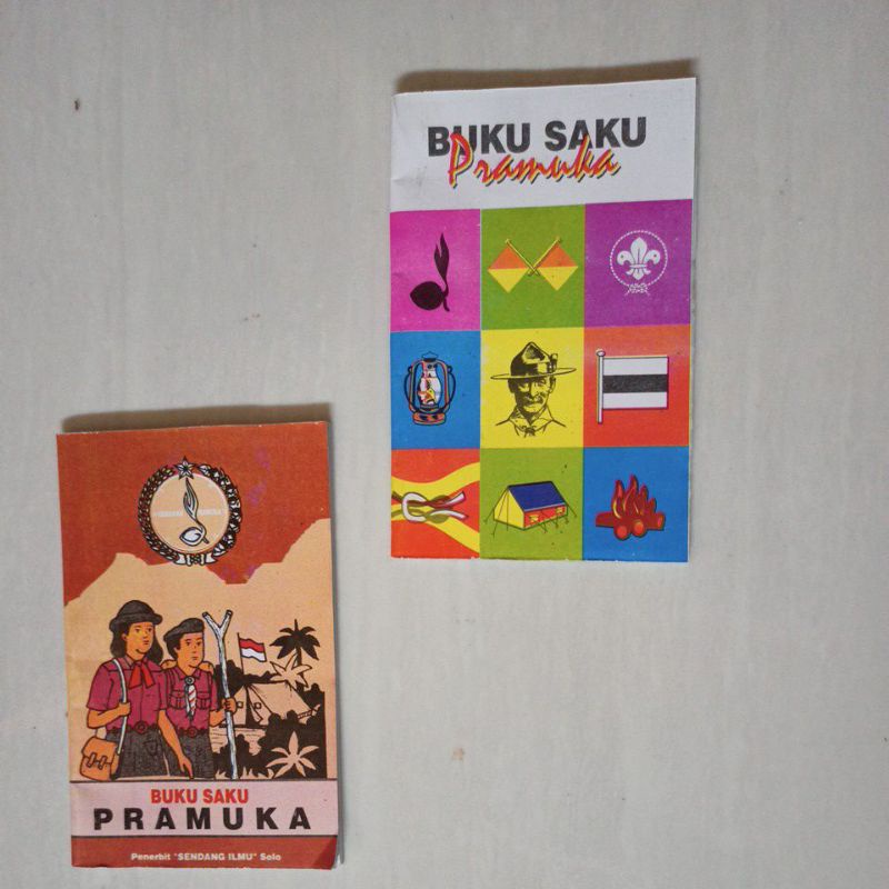 buku saku Pramuka 100 biji background warna coklat dan warna putih terbaru