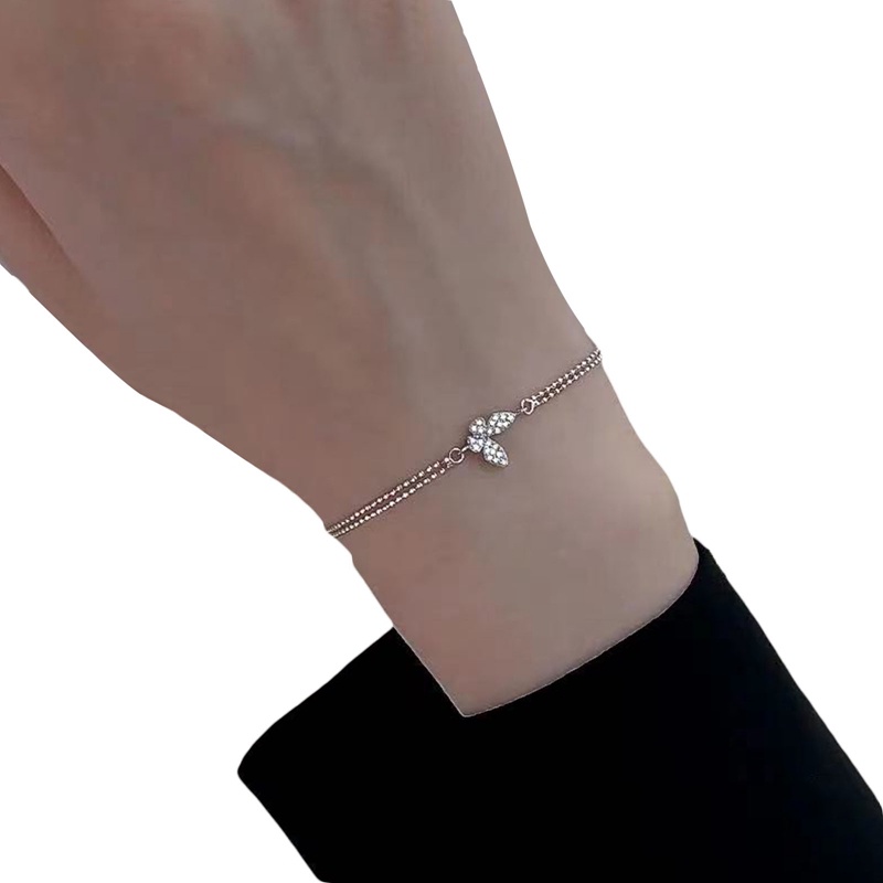 Gelang Rantai Desain Kupu-Kupu Aksen Zircon Warna Silver Anti Alergi Untuk Wanita