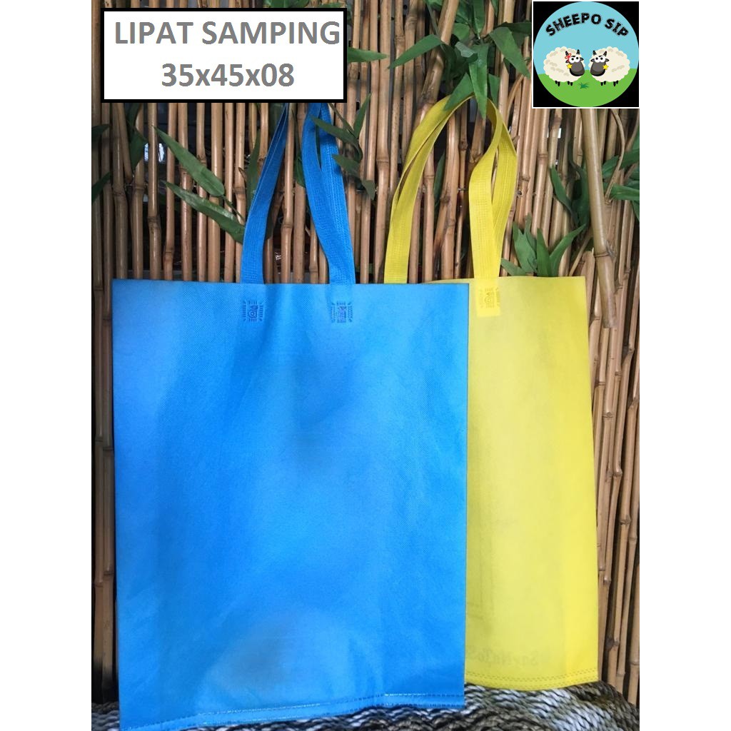 

TAS GOODIE BAG LIPAT SAMPING - TAS KAIN SEMINAR - TAS SEMBAKO SPUNBOND 35X45X08 KUAT WARNA