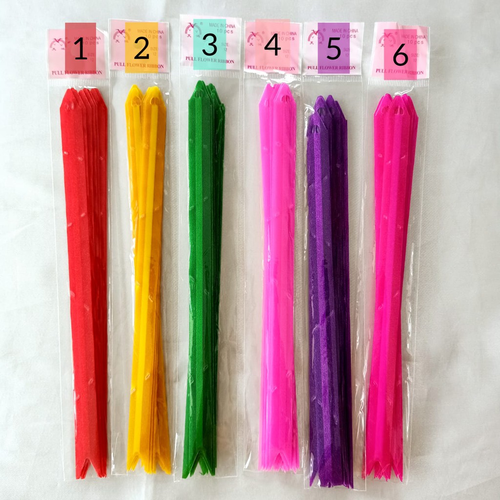 

Pita Serut Motif / Pita Tarik Warna