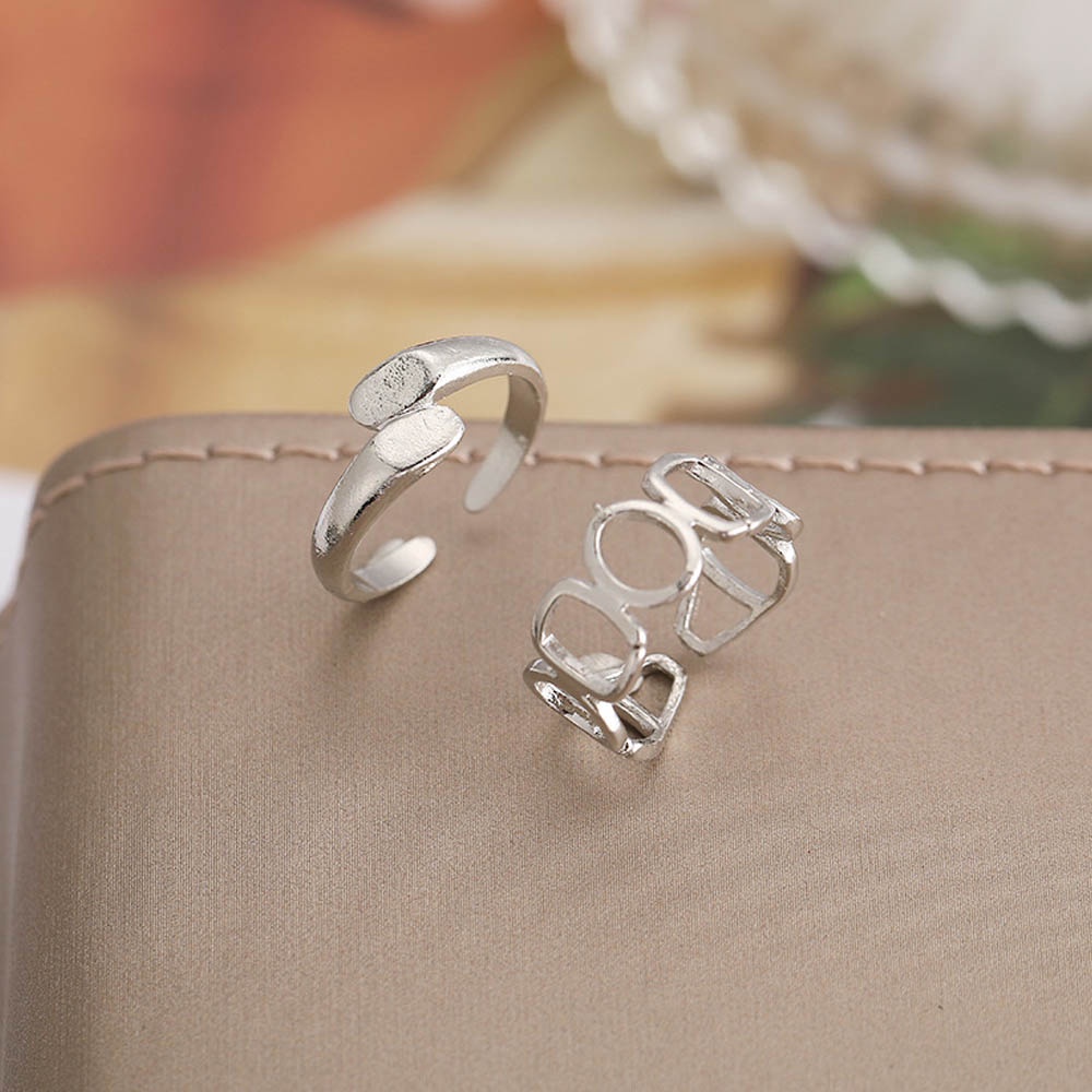 2pcs / Set Cincin Model Terbuka Bahan Metal Desain Geometri Hollow Warna Silver Gaya Simple / Trendy Adjustable Untuk Wanita