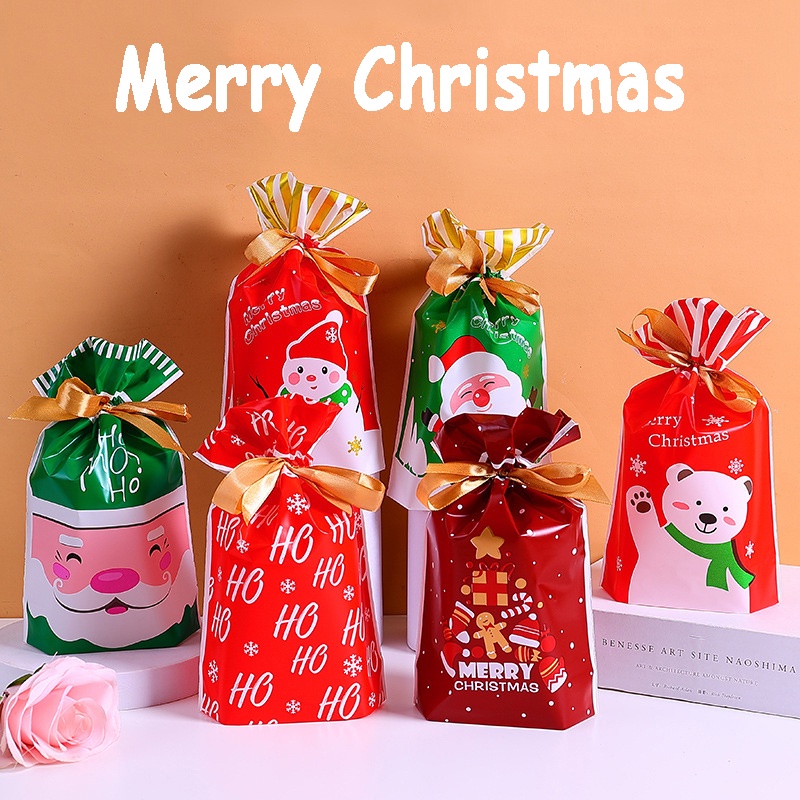 10pcs / Set Kantong Plastik Motif Print Kartun Santa Claus Model Serut Untuk Dekorasi Natal