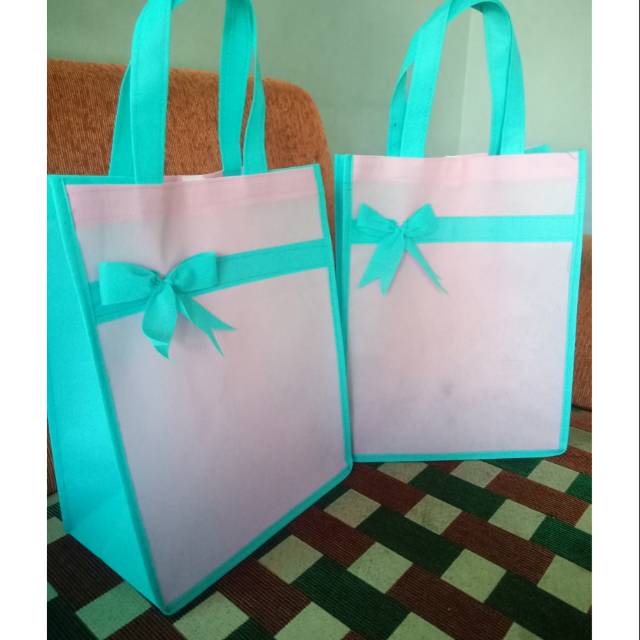 

goody bag polos tanpa sablon kain TEBAL ukuran P23 L14 T30 (1pack isi 12pc)READY
