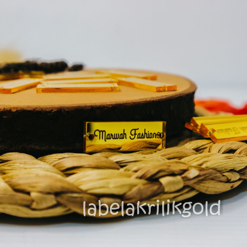 

label hijab | label baju | label akrilik | custom label | label jilbab | label cutting | label gold