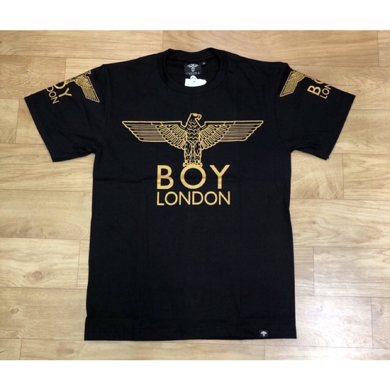 BOY4 KAOS BOY LONDON IMPORT PRIA WANITA ASIA EROPA KOREA AMERIKA GOLD ON BACK AND WHITE