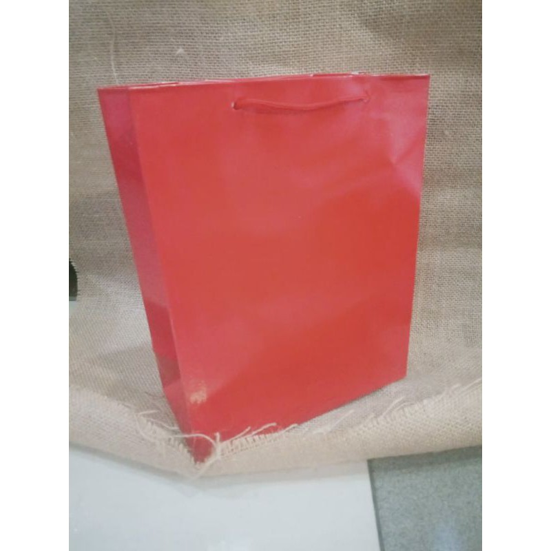 

paper bag buku merah bahan dupex isi 12 pcs terlaris dan termurah