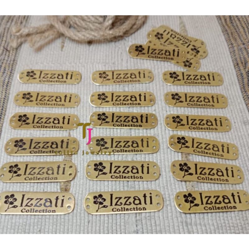 (min 50) label baju ,label  hijab plat logam Kuningan .
