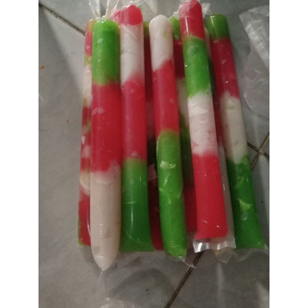 

es lilin pelangi,jelly susu 10k 15 biji