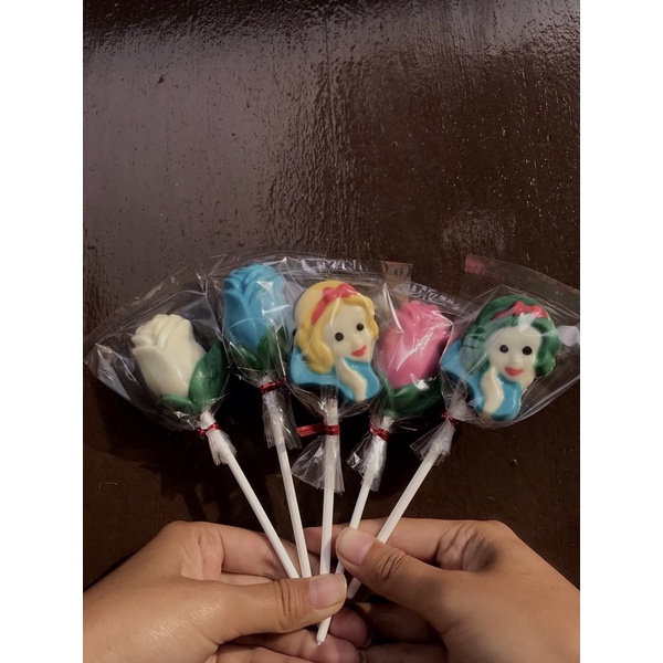 

coklat karakter stik/gagang/lucu snow white dan bunga mawar- tangerang