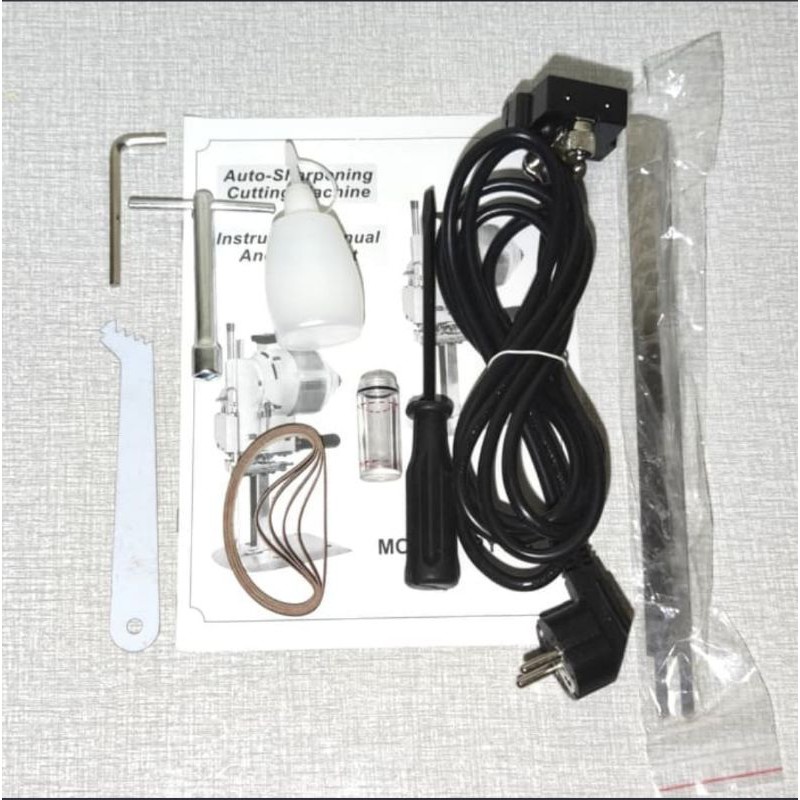 Mesin Potong Kain Tegak 10&quot; KM China 750Watt