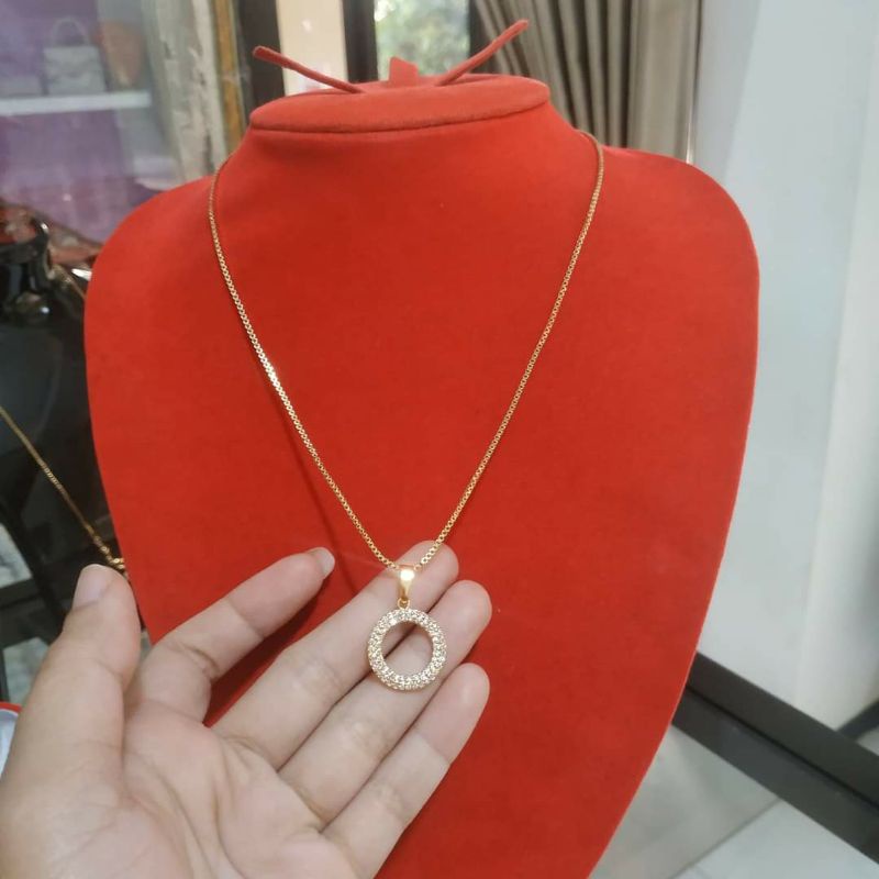 kalung n liontin