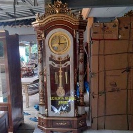 Lemari jam ukir almari jam hias besar jam lonceng bandul bunyi ukir kayu jati