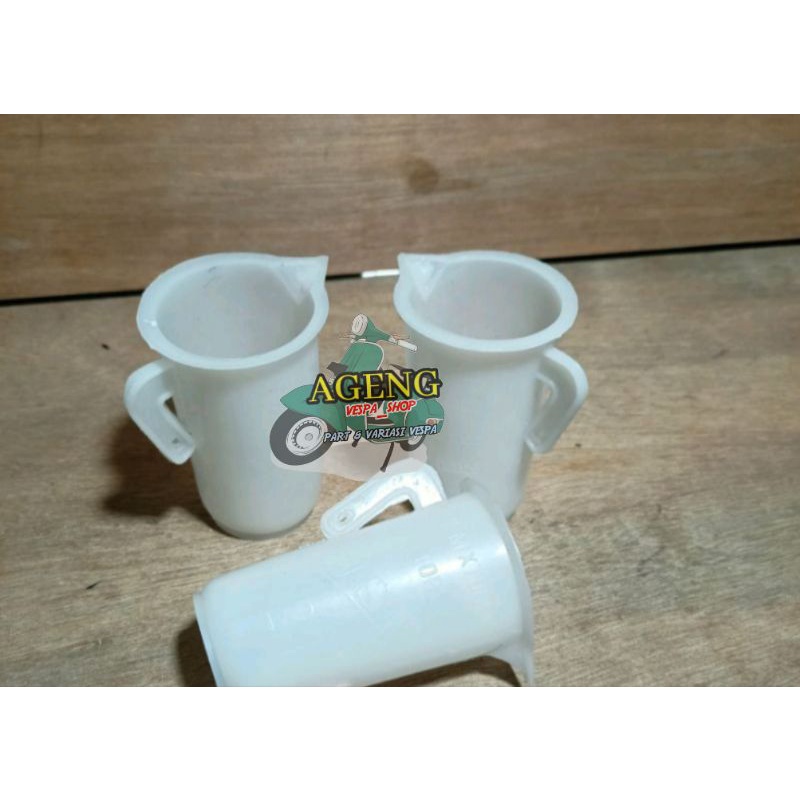 Gelas takar oli samping vespa wadah takaran oli vespa