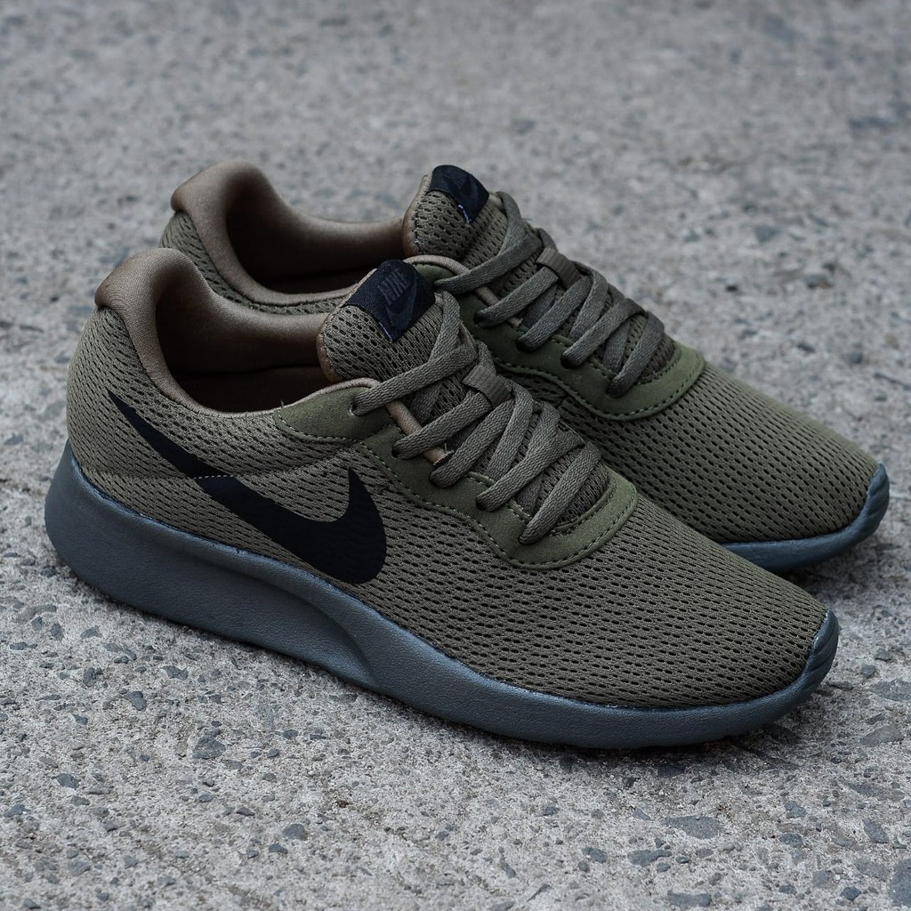 olive green nike tanjun