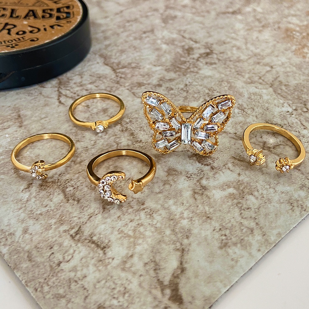 5pcs / Set Cincin Adjustable Desain Kupu-Kupu Bulan Bintang Aksen Kristal Warna Emas Untuk Wanita