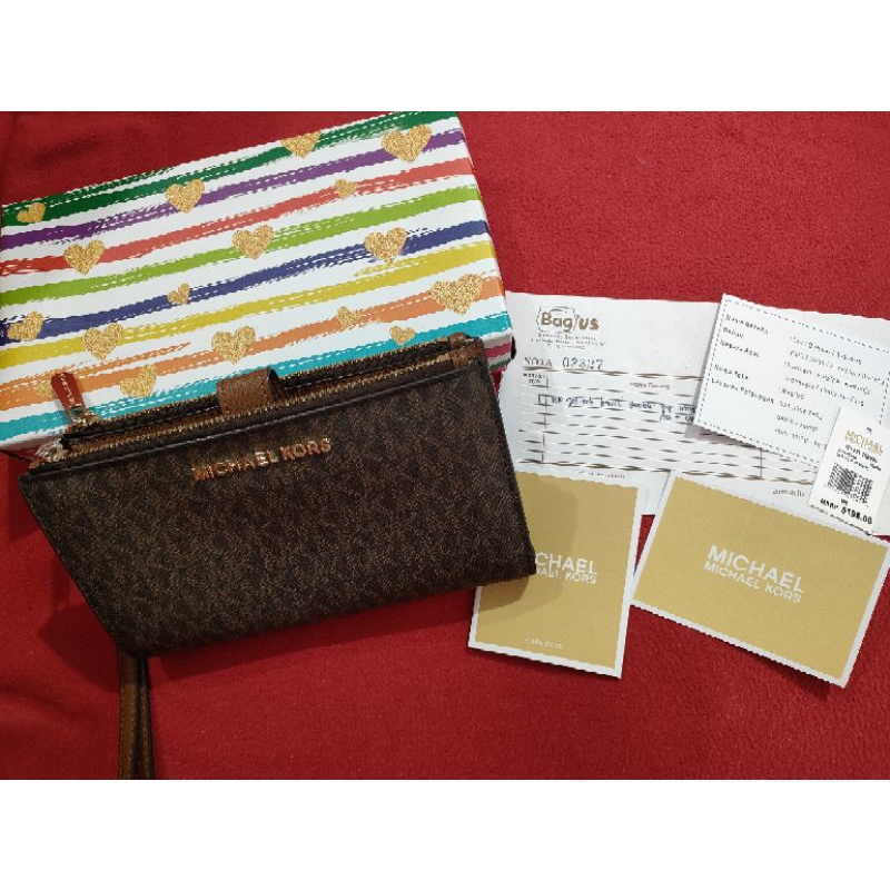 Preloved Dompet Michael Kors Jet Set Travel Double Zip Wrislet Brown