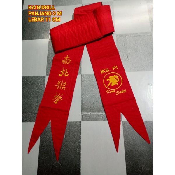 SABUK MERAH IKS.PI KERA SAKTI BORDIR 02 Kain Drill