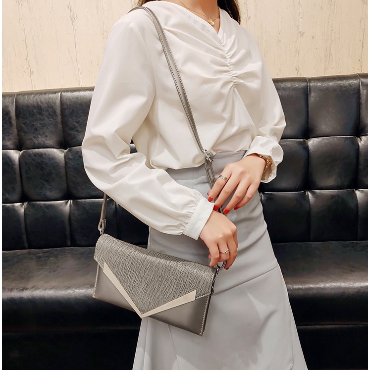 LX111456 Tas clutch pesta wanita import terbaru 1kg bisa 2 tas supplier tas import GT1456