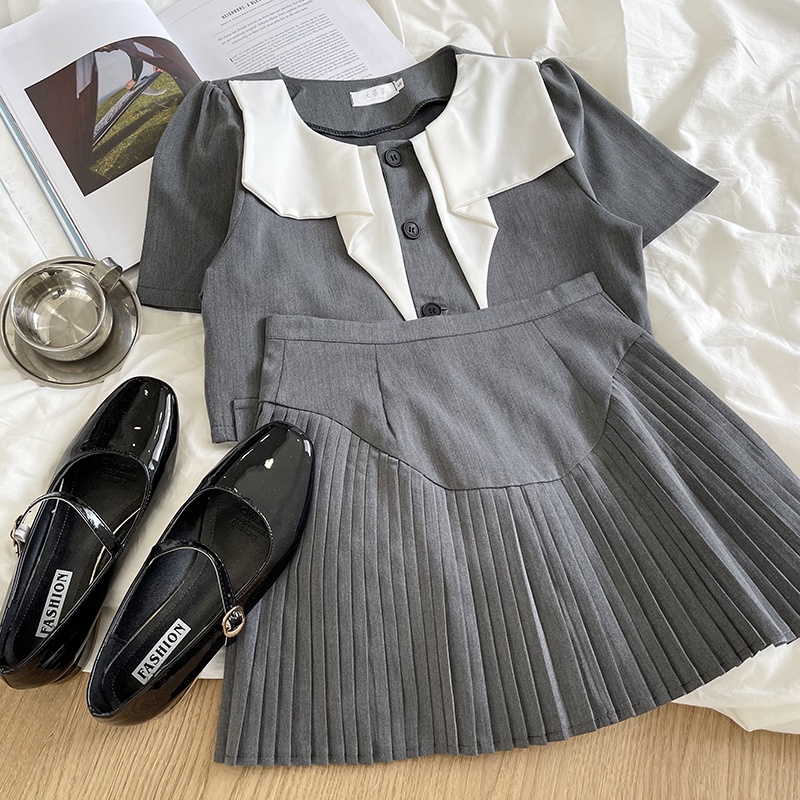 Temperamen Colorblock Collar Irregular Suit Dengan Bahu Depan Empuk Atasan Kecil + Rok Lipit Ramping Pinggang Tinggi