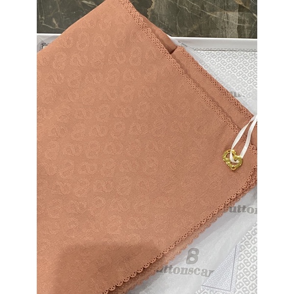 buttonscarves tapis embossed cantaloupe