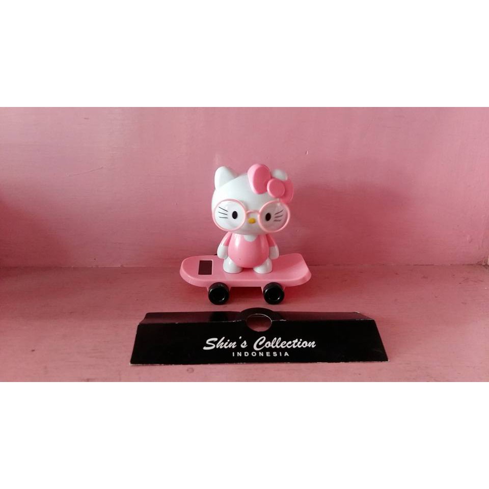 pajangan solar hello kitty skateboard
