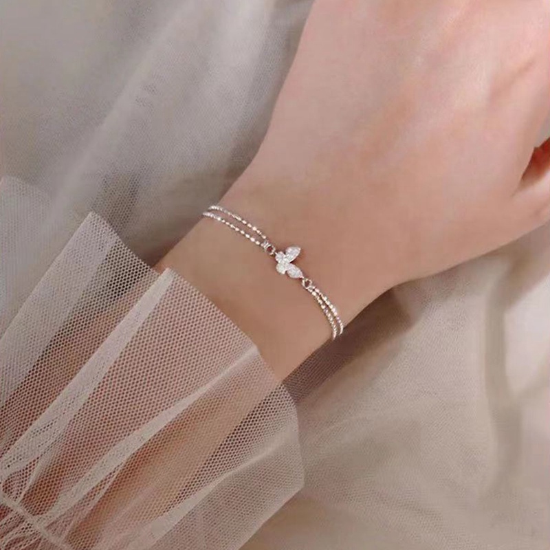 Gelang Rantai Desain Kupu-Kupu Aksen Zircon Warna Silver Anti Alergi Untuk Wanita