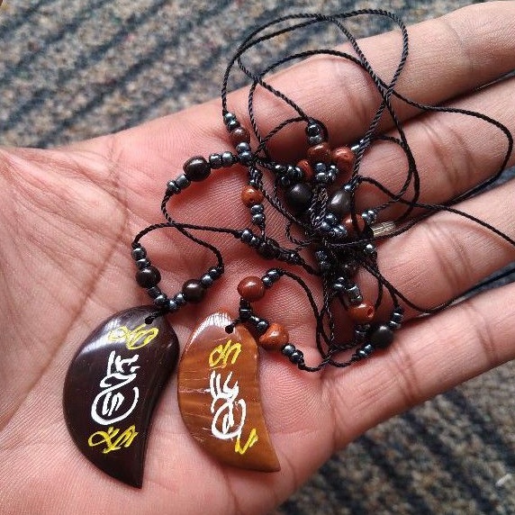 kalung kokka motif daun rajah manik hitam