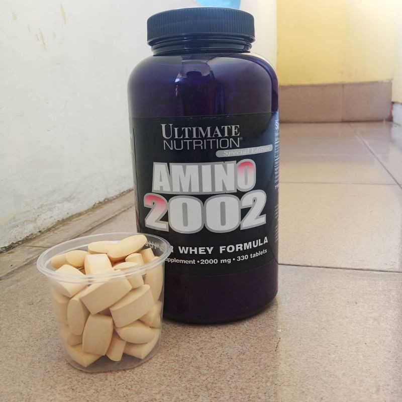 amino 2002 ultimate nutrition whey protein eceran 1 tablet