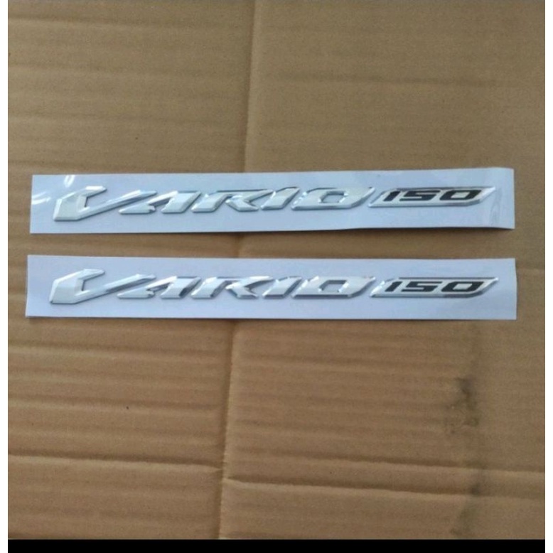 EMBLEM TIMBUL VARIO 125 150 NEW ORIGINAL