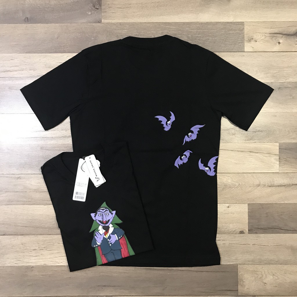 KAOS UNIQLO x KAWS (SUMMER UT GRAPHIC BLACK) - 100% COTTON - TERLARIS-VAMPIRE