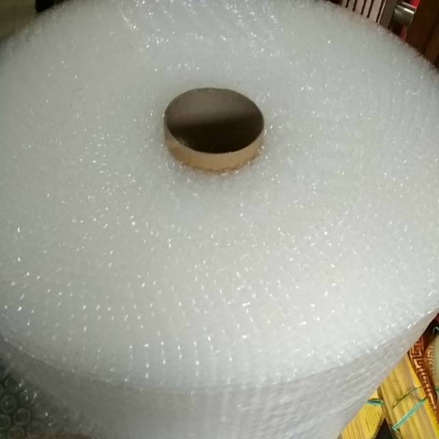 

BUBBLE WRAP PERLINDUNGAN PAKET PLASTIK WRAP AGAR AMAN