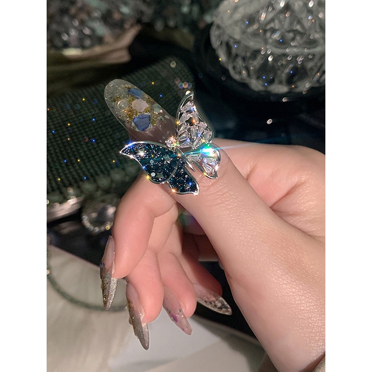 Cincin Model Terbuka Adjustable Desain Kupu-Kupu Biru Aksen Zircon Untuk Wanita