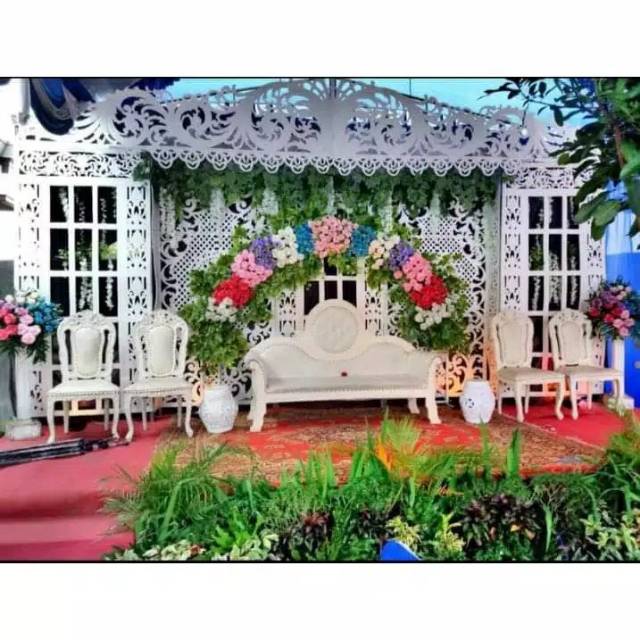 Ukiran pelaminan spon jendela