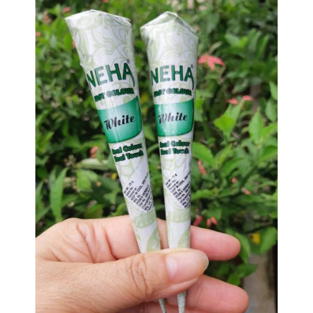 

Golecha White NEHA Henna Body Painting