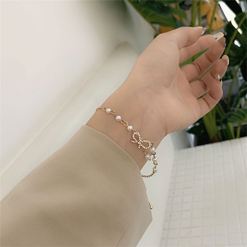 Gelang Korea Fashion Busur Mutiara Hias Berlian Imitasi Bangle Liar Aksesoris Fashion-Won