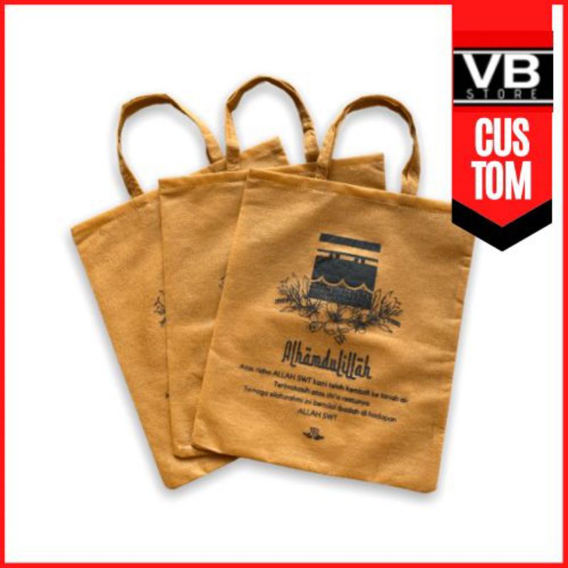 

TAS SOUVENIR HAJI UMROH BAHAN SPUNBOND TEBAL KUAT TOTE BAG OLEH-OLEH MURAH JAWA TIMUR GAMBAR MASJID KA'BAH READY SIAP KIRIM F25.30