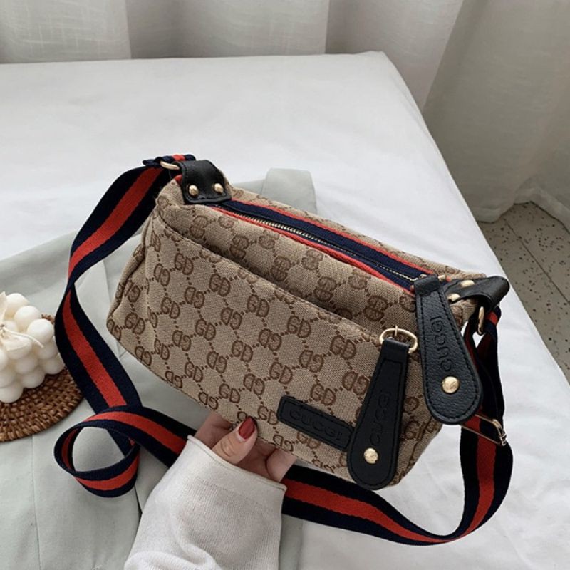 gucci monogram sling bag