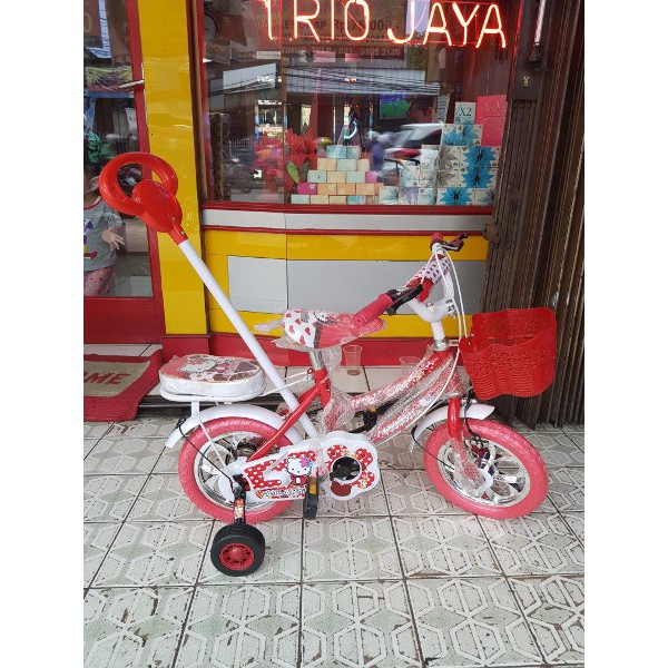 sepeda anak hello kitty 12 dorongan stir.