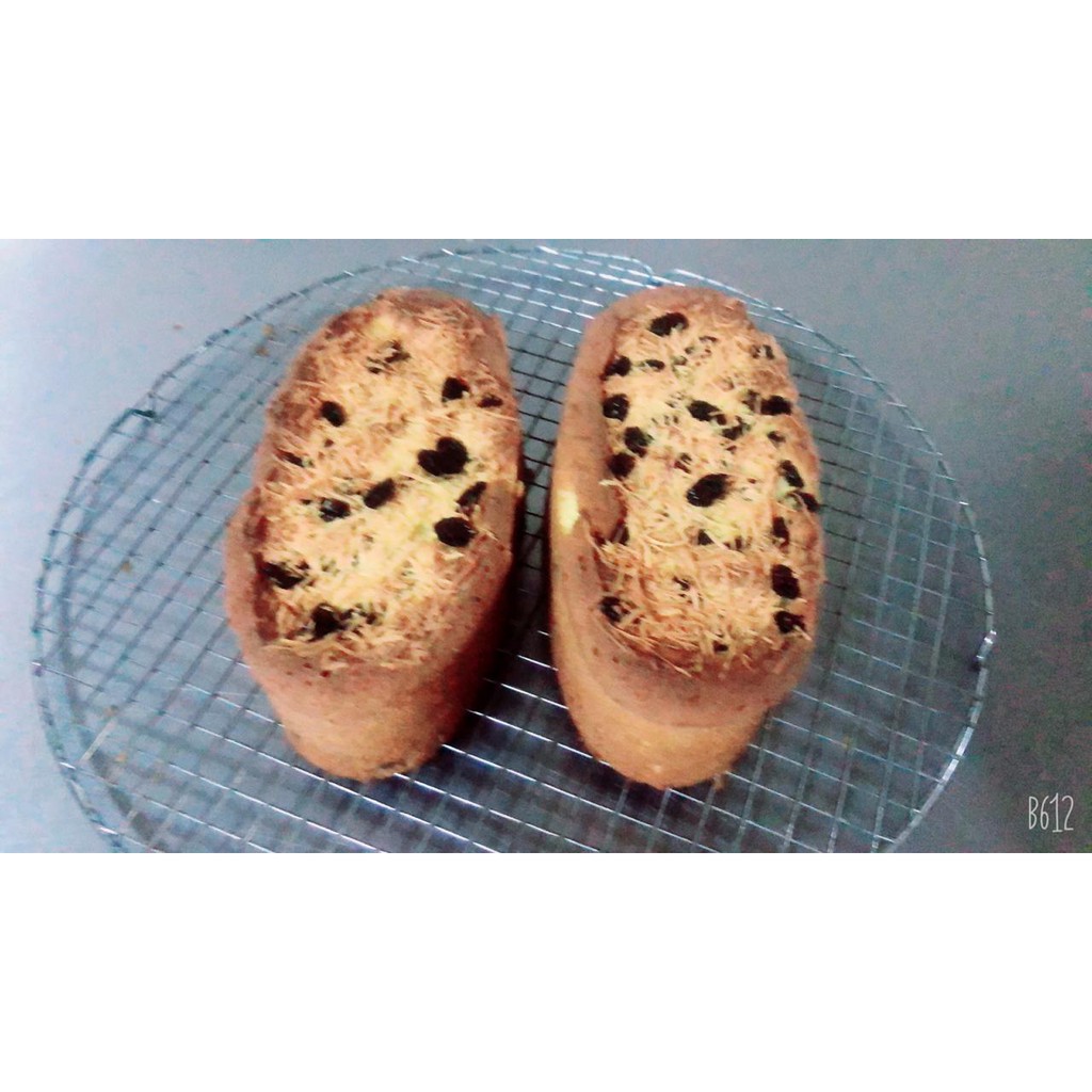 

CAKE OVAL TAPE KEJU KISMIS