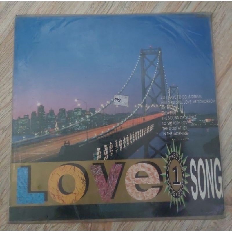 Kaset Laser disc lagu Love Song 1