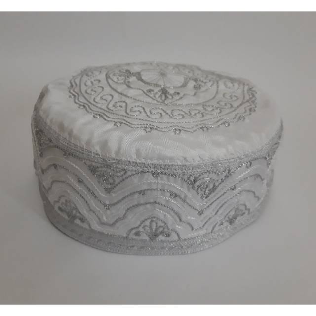 Peci dewasa al zahra .