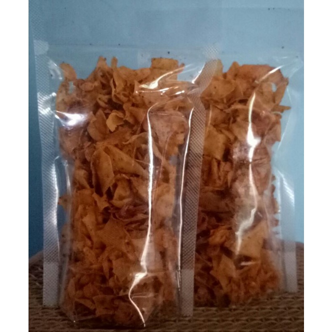 

Snack Makanan Ringan Cemilan Instan Keripik Singkong Serut BREKELE PEDAS Khas Kebumen Kemasan 100Gram