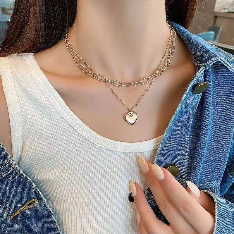 Cahaya mewah minoritas cinta twin kalung sweter wanita ins gaya dingin sweater chain Panjang all-mat