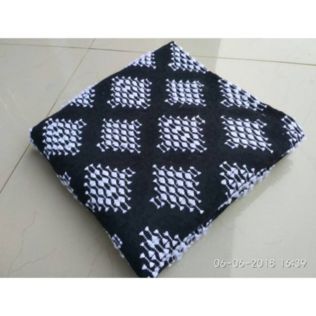 Kain tenun sutra bulu