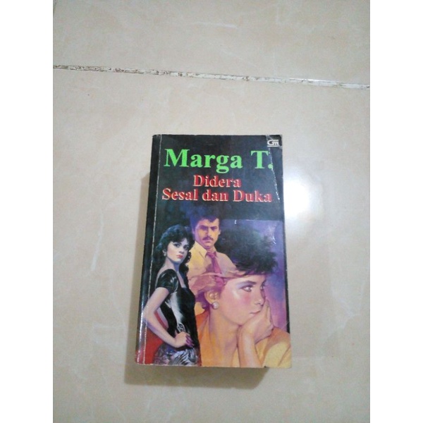 novel  Marga T. Didera Sesal dan Duka   r
