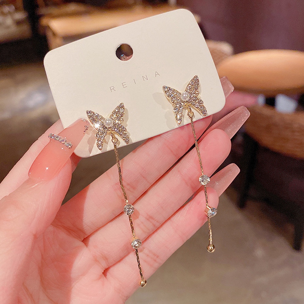Anting Tusuk Gantung Desain Kupukupurumbai Rantaimutiaraberlian Imitasi Gaya Koreaelegan Untuk Wanita