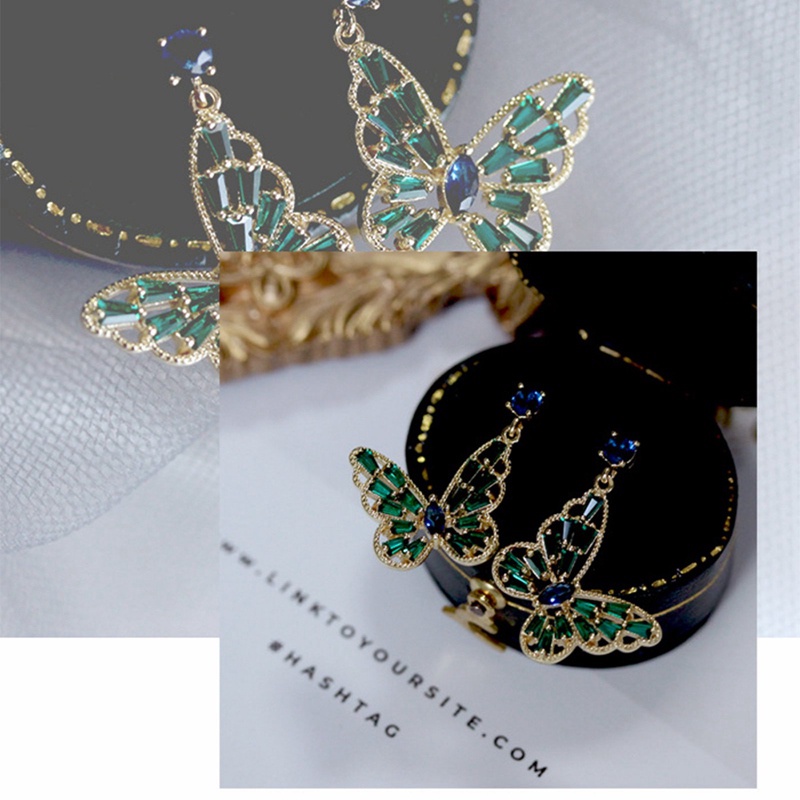 Anting Kait Gantung Desain Kupukupu Hollow Hias Zircon AAAAA Warna Hijau Berkilau Untuk Wanita